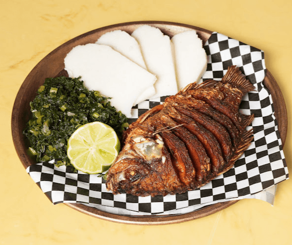Fried tilapia with ugali and sukuma wiki